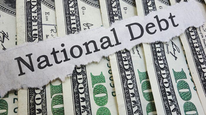 What is the national debt, and how is the deficit different?